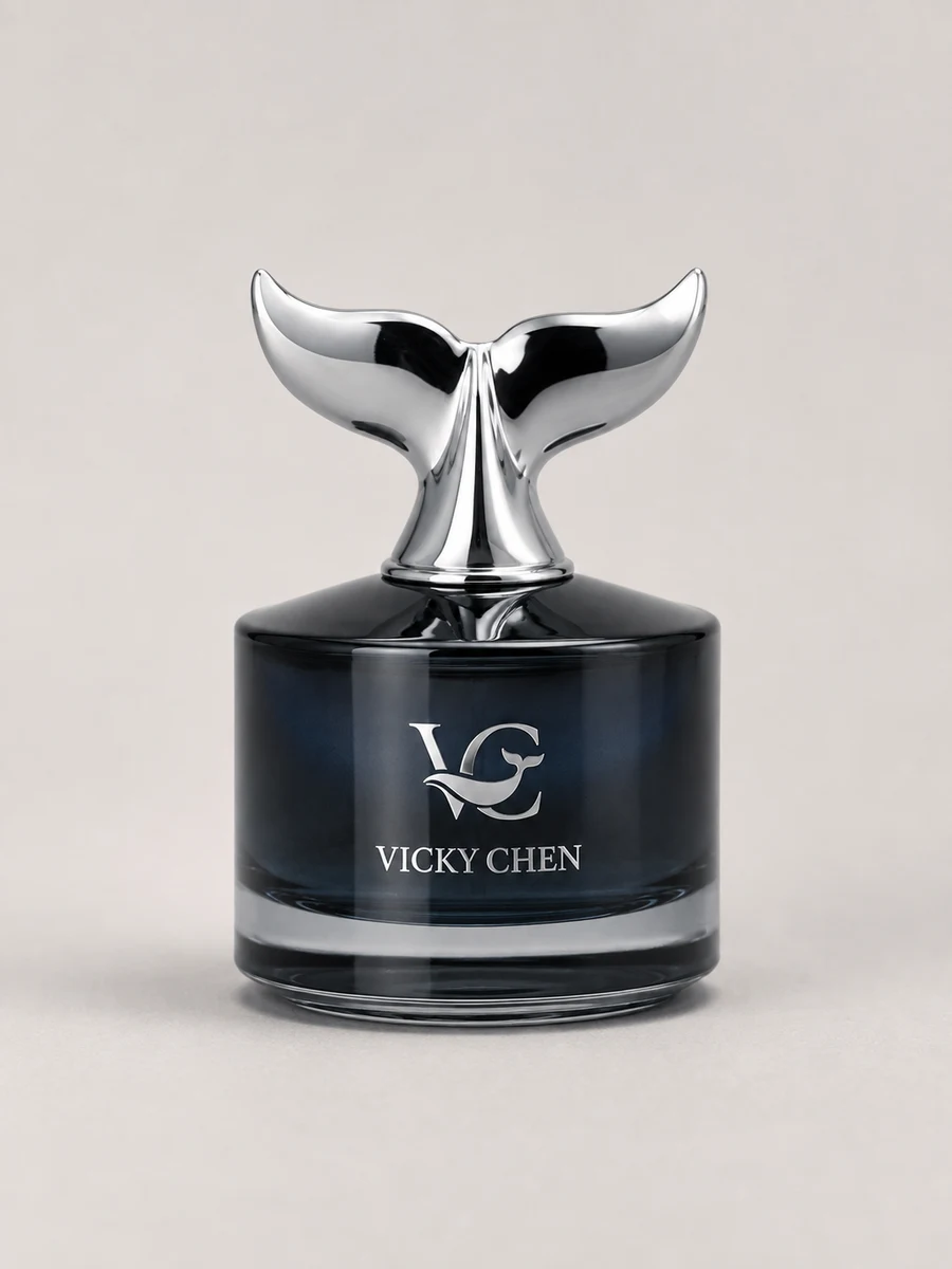 Recreated VICKY CHEN perfume bottle with a silver whale-tail cap on a light studio background